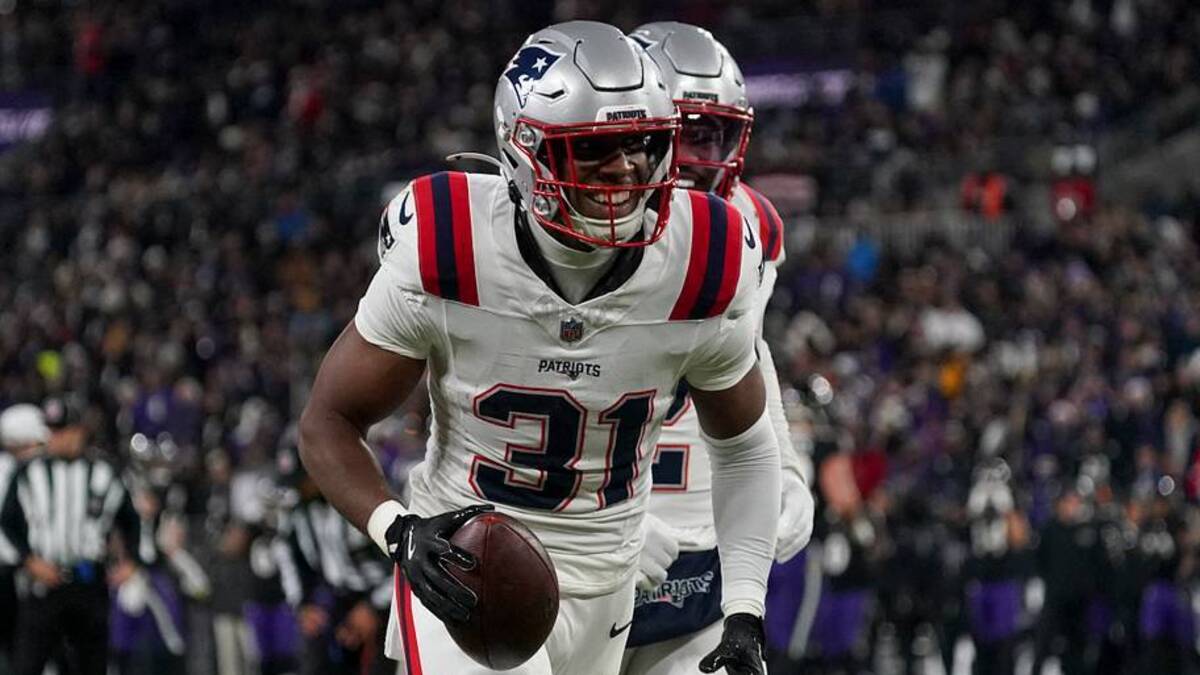  Dec 21, 2025; Baltimore, Maryland, USA; New England Patriots safety Craig Woodson (31) celebrates a Patriots recovering a fumble by Baltimore Ravens running back Derrick Henry (not pictured) during the first half of the game at M&T Bank Stadium. Mandatory Credit: James Lang-Imagn Images | IMAGN IMAGES via Reuters Connect 