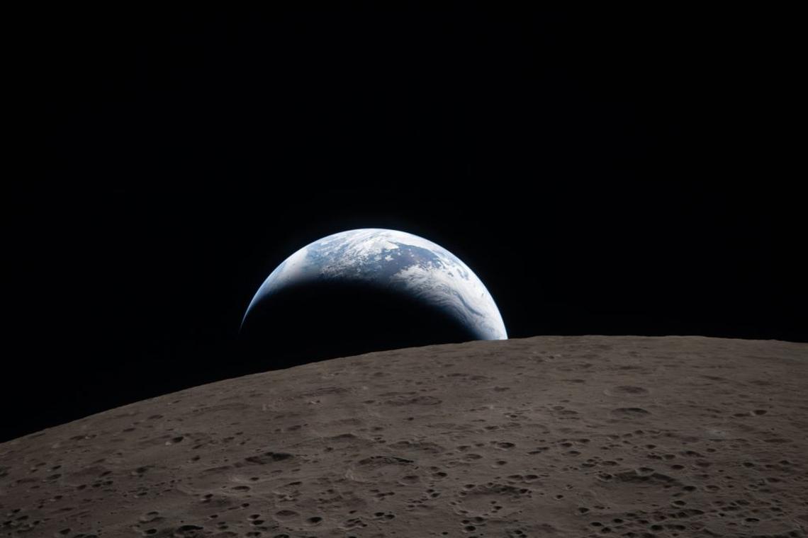  Earthset captured through the Orion spacecraft during the Artemis II crew's flyby on April 6. (Photo by NASA) 