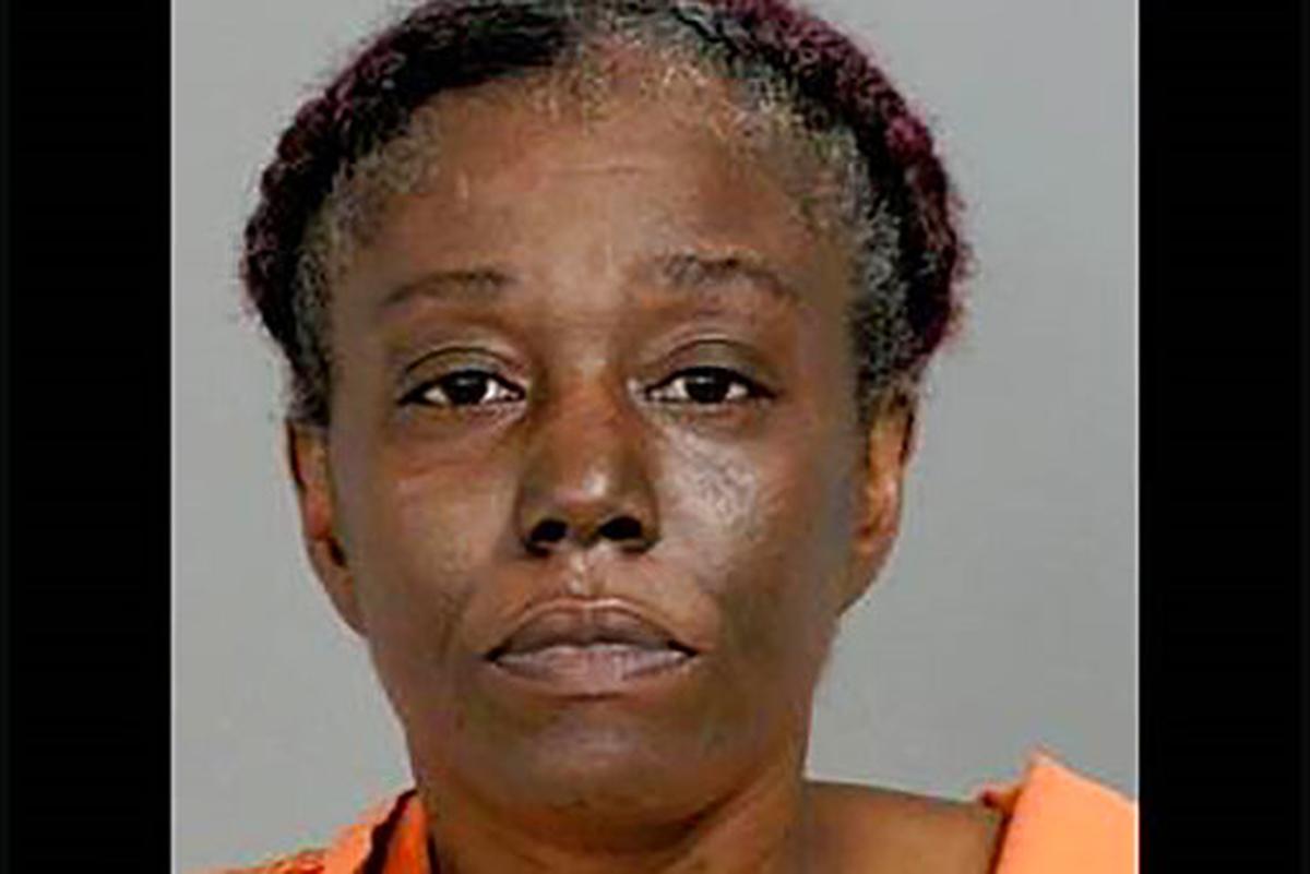 This undated booking photo provided by the Genesee County prosecutor’s office shows Sharmel Teague. State police are investigating whether a security guard, Calvin Munerlyn, 43, at a Flint, Mich., Family Dollar store was fatally shot because he refused to allow a customer to enter without wearing a face mask to protect against transmission of the coronavirus. Teague, who is in custody, her husband Larry Teague, and her adult son Ramonyea Bishop, both fugitives, have been charged in the fatal shooting of Munerlyn. (Genesee County Prosecutor’s Office via AP)