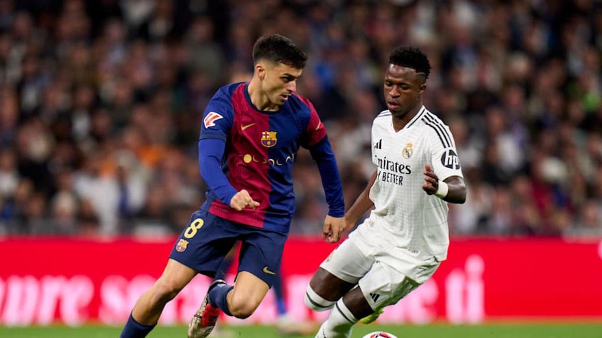 Pedri (left) and Vinicius Junior headline Sunday's Clásico. | Diego Souto/Getty Images 