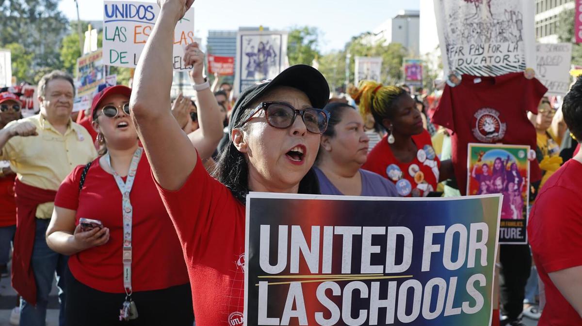 Rosalva Barajas, a teacher at Tweedy Elementary School, joins other teachers and union members at a rally in Gloria Molina Grand Park in Los Angeles on Wednesday, March 18, 2026. (Gina Ferazzi/Los Angeles Times/TNS)