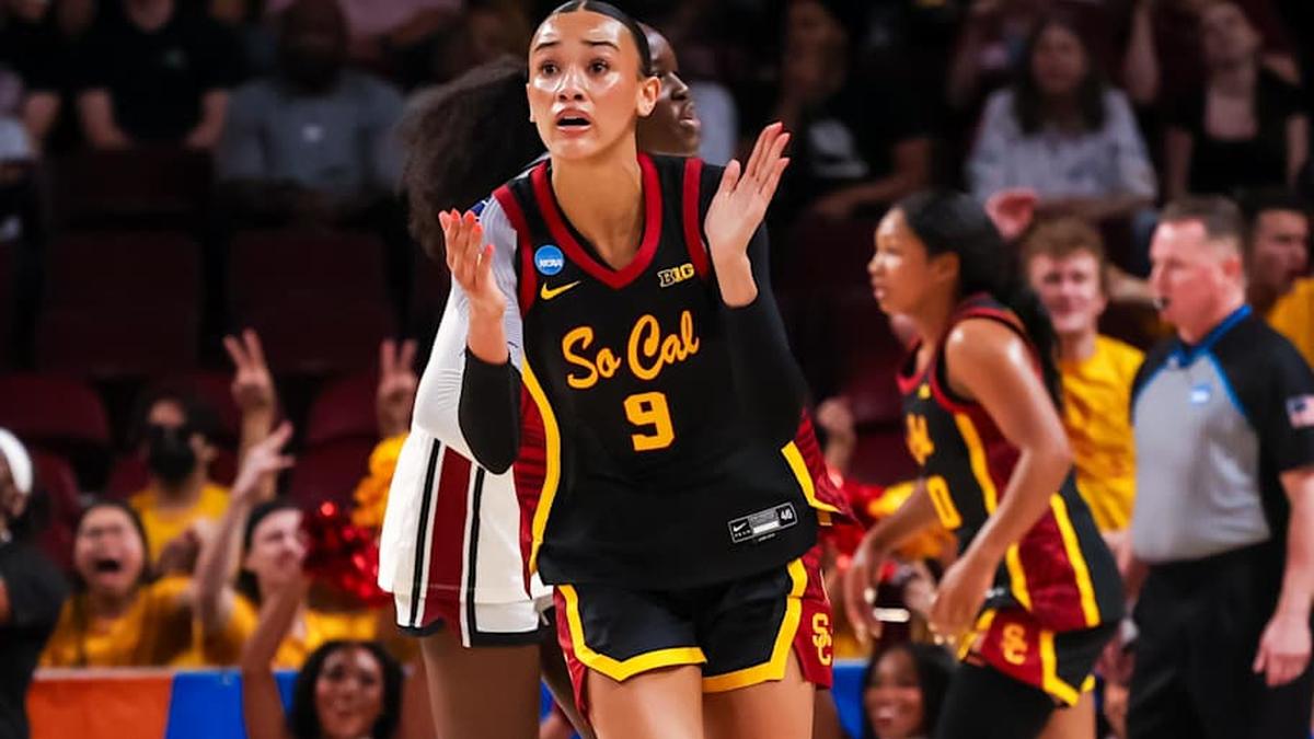  Mar 23, 2026; Columbia, South Carolina, USA; USC Trojans guard Jazzy Davidson (9) celebrates a three point basket against the South Carolina Gamecocks in the second half at Colonial Life Arena. Mandatory Credit: Jeff Blake-Imagn Images | Jeff Blake-Imagn Images 