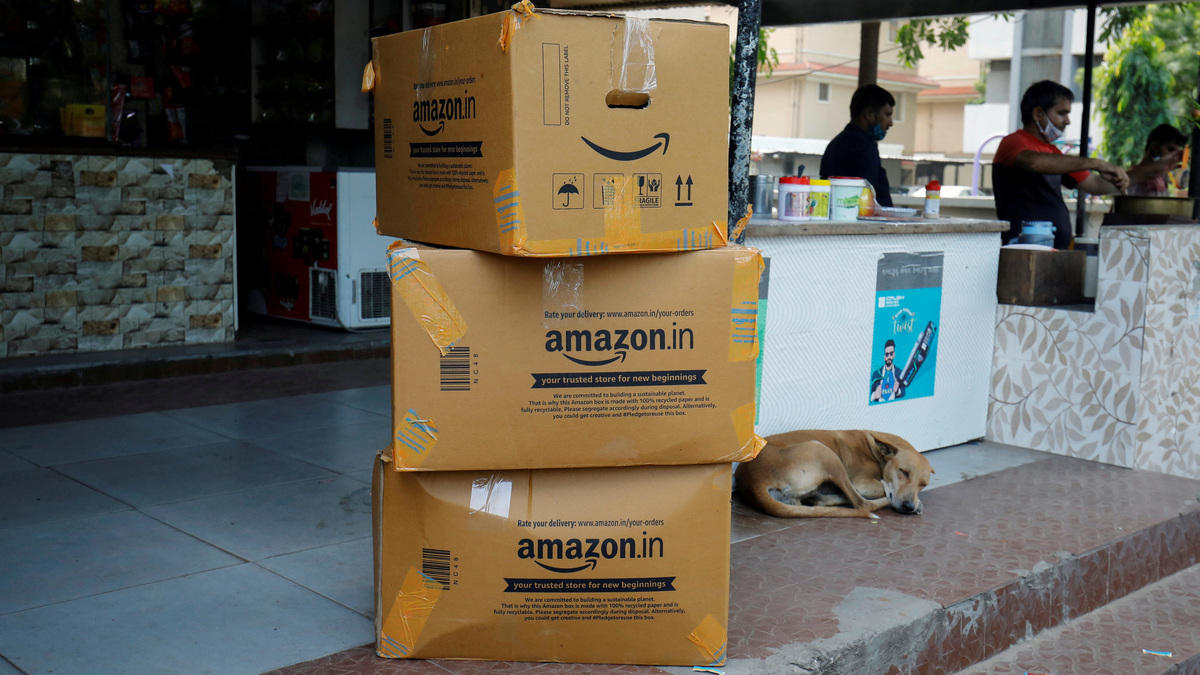 FILE PHOTO: Amazon delivery packages are seen outside a shop in Ahmedabad, India, October 5, 2021. REUTERS/Amit Dave/File Photo