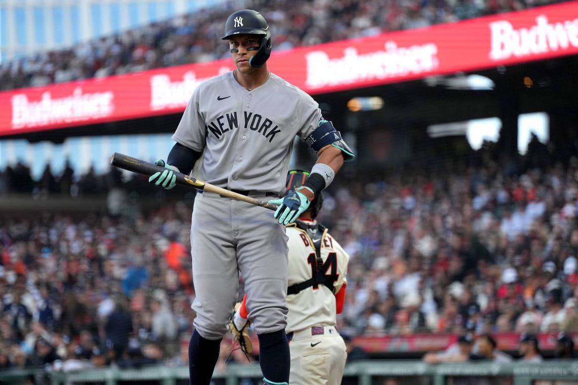  Mar 25, 2026; San Francisco, California, USA; New York Yankees right fielder Aaron Judge (99) holds onto his bat after fouling off a pitch against the San Francisco Giants in the third inning at Oracle Park. Mandatory Credit: Cary Edmondson-Imagn Images 