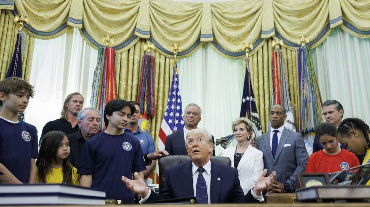 President Donald Trump signs a proclamation Tuesday inside the Oval Office at The White House in Washington, D.C. The memorandum is set to restore the Presidential Fitness Test Award, a competitive school-based fitness program last seen under the Obama administration. Photo by Tom Brenner/UPI