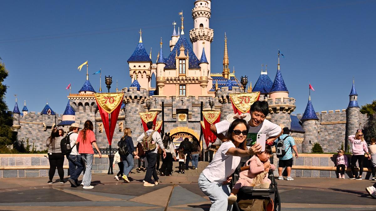 Visitors take a selfie at Sleeping Beauty Castle inside Disneyland at the Disneyland Resort Anaheim, CA, on Friday, January 16, 2026. (Photo by Jeff Gritchen, Orange County Register/SCNG)