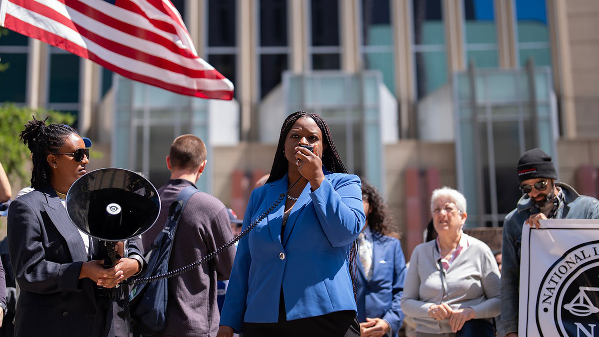 Nekima Levy Armstrong, a civil rights lawyer and social activist, speaks to a crowd of demonstrators outside the Diana E. Murphy Courthouse in Minneapolis on June 16, 2026. Dozens of people gathered to protest the charging and arrests of 15 anti-ICE demonstrators who were active during Operation Metro Surge. (Alex Kormann/The Minnesota Star Tribune/TNS)