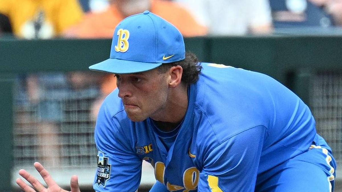  Jun 14, 2025; Omaha, Neb, USA; UCLA Bruins shortstop Roch Cholowsky (1) fields a ground ball against the Murray State Racers during the ninth inning at Charles Schwab Field. Mandatory Credit: Steven Branscombe-Imagn Images | Steven Branscombe-Imagn Images 