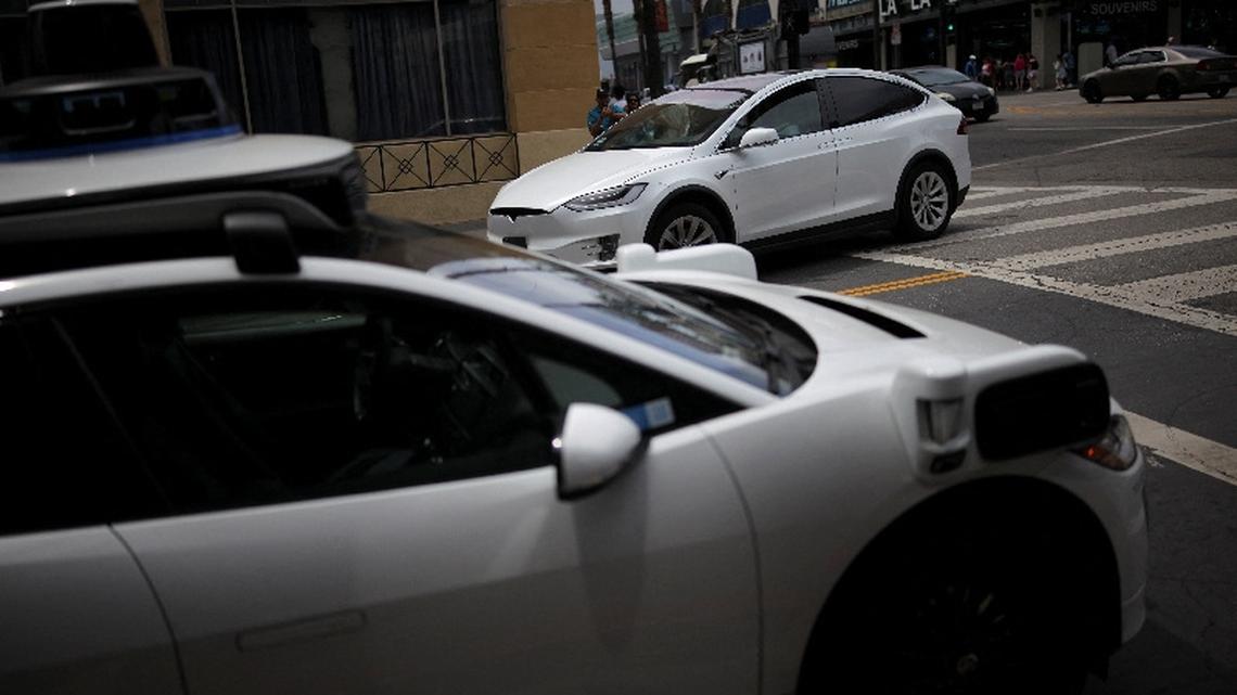 Tesla's Musk expects widespread use in US of cars without human monitors this year 