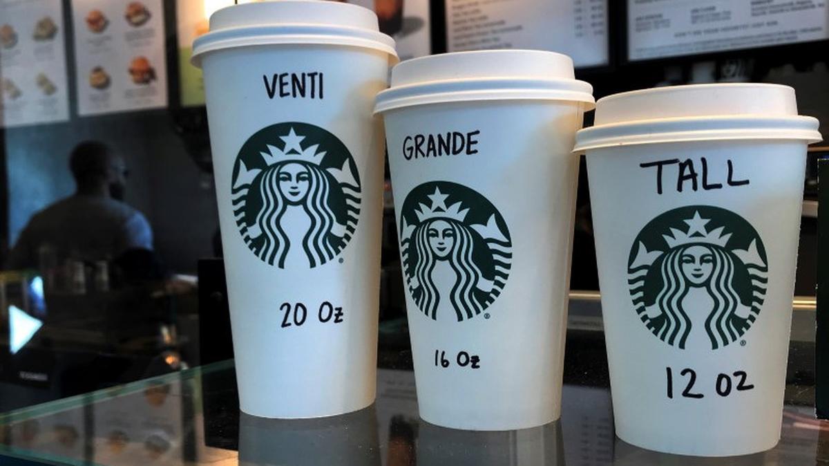 Starbucks cups are pictured on a counter in the Manhattan borough of New York City, New York, U.S., February 16, 2022. REUTERS/Carlo Allegri