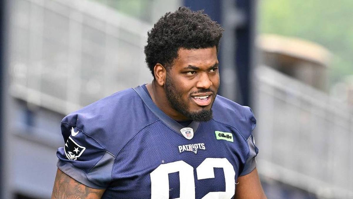  Jun 9, 2025; Foxborough, MA, USA; New England Patriots defensive tackle Joshua Farmer (92) walks to the practice fields at Gillette Stadium. Mandatory Credit: Eric Canha-Imagn Images | Eric Canha-Imagn Images 