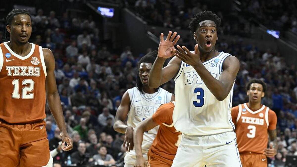  Mar 19, 2026; Portland, OR, USA; BYU Cougars forward AJ Dybantsa (3) reacts after a play in the first half against the Texas Longhorns during a first round game of the men's 2026 NCAA Tournament at Moda Center. | Craig Strobeck-Imagn Images 