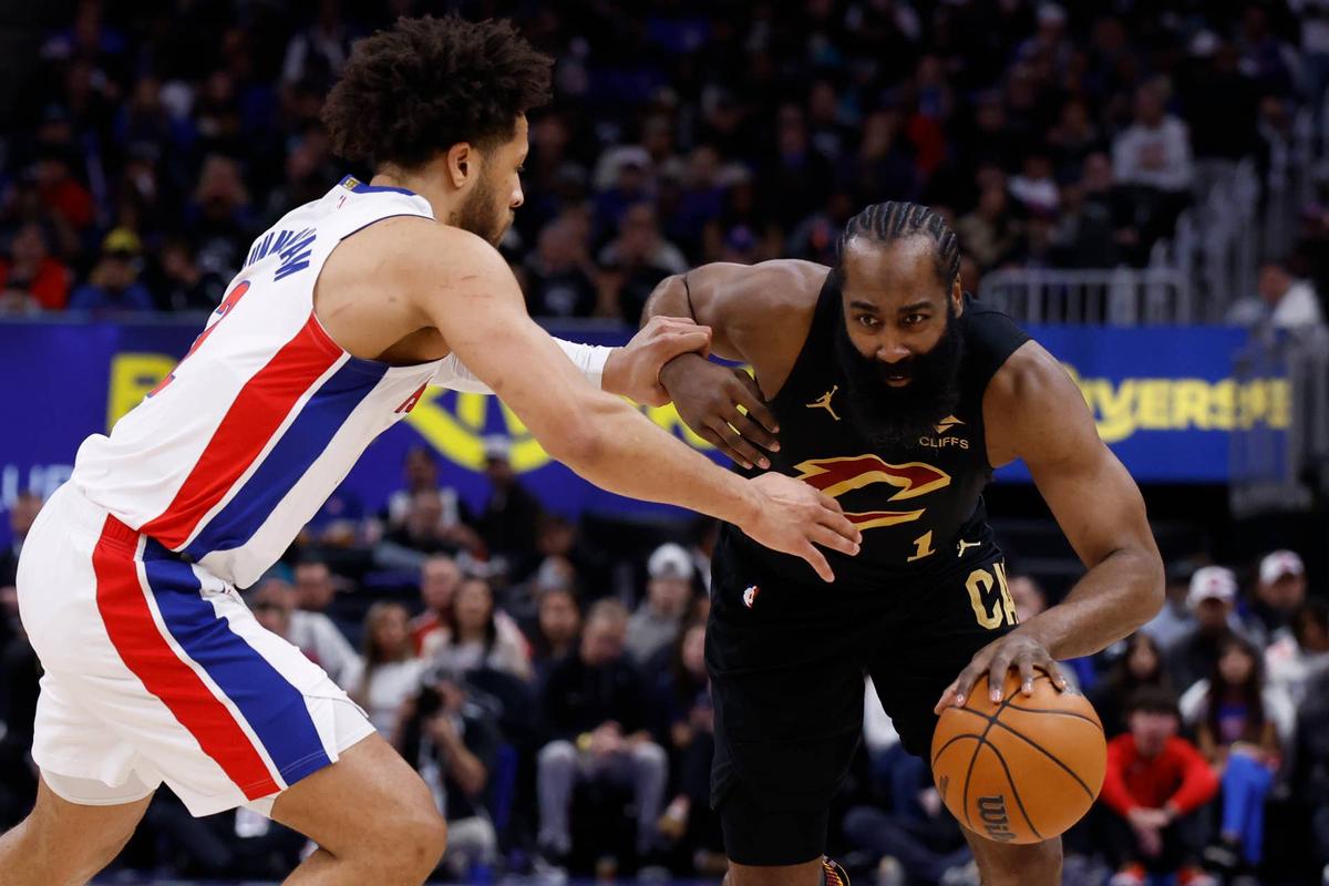  Cleveland Cavaliers guard James Harden dribbles defended by Detroit Pistons guard Cade Cunningham. Rick Osentoski-Imagn Images