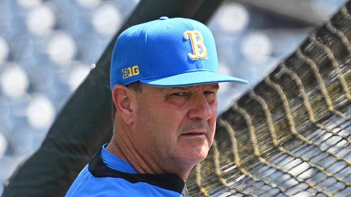  Jun 14, 2025; Omaha, Neb, USA; UCLA Bruins head coach John Savage watches the team warm up before the game against the Murray State Races at Charles Schwab Field. Mandatory Credit: Steven Branscombe-Imagn Images | Steven Branscombe-Imagn Images 