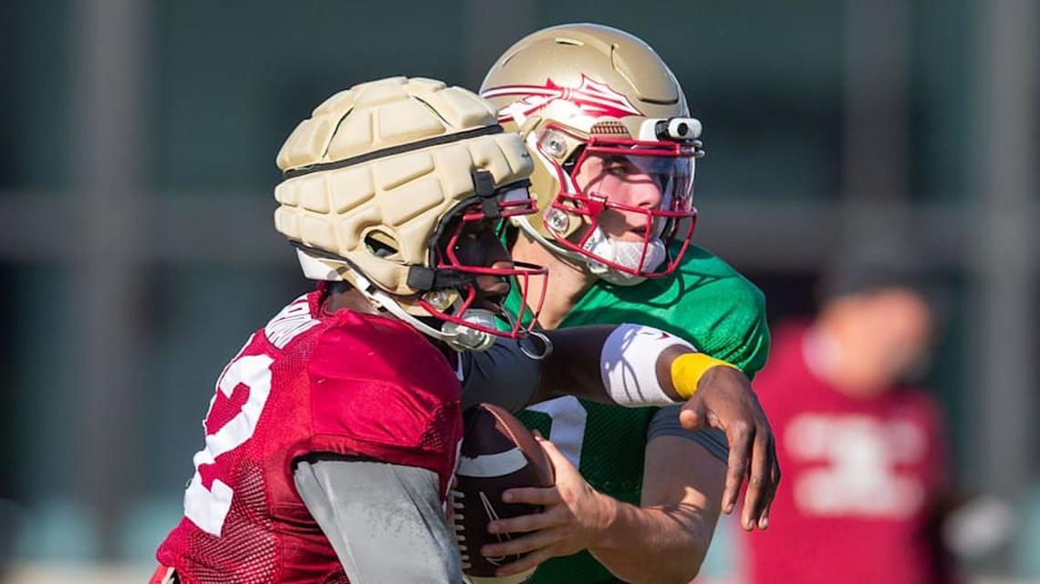  Florida State Seminoles quarterback Kevin Sperry (9) fakes a handoff during practice Thursday, April 9, 2026. | Alicia Devine/Tallahassee Democrat / USA TODAY NETWORK via Imagn Images 