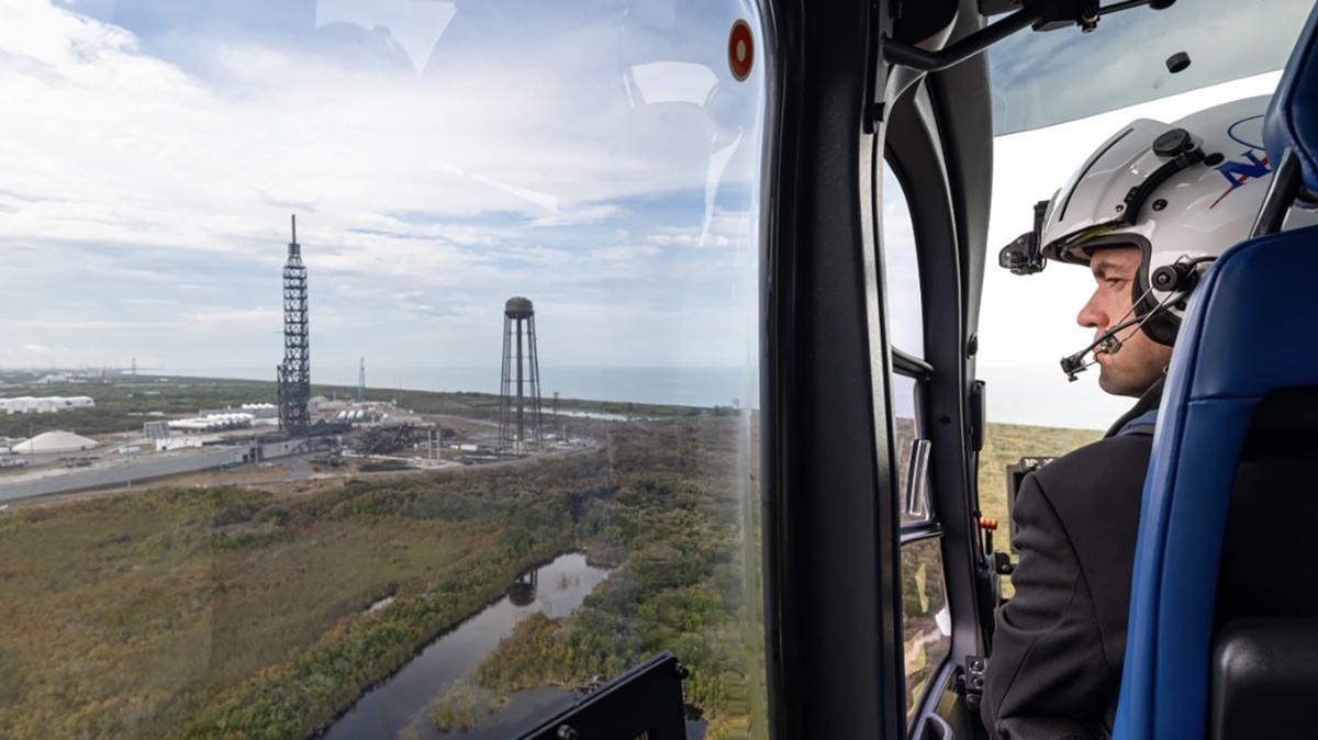NASA Administrator Jared Isaacman is seen during a helicopter flight, Friday, May 29, 2026, at Cape Canaveral Space Force Station in Florida. The flight surveyed Launch Complex 36 following a New Glenn hotfire test anomaly on May 28. (John Kraus/NASA/TNS)