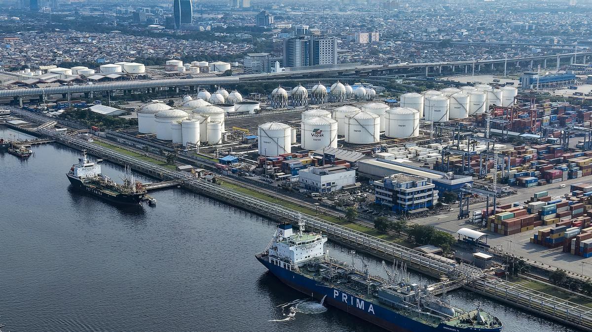 This aerial picture shows tankers and cargo ships at the oil depot and container terminal of Tanjung Priok Port, Jakarta, on March 31, 2026. (Bay Ismoyo/AFP via Getty Images/TNS)