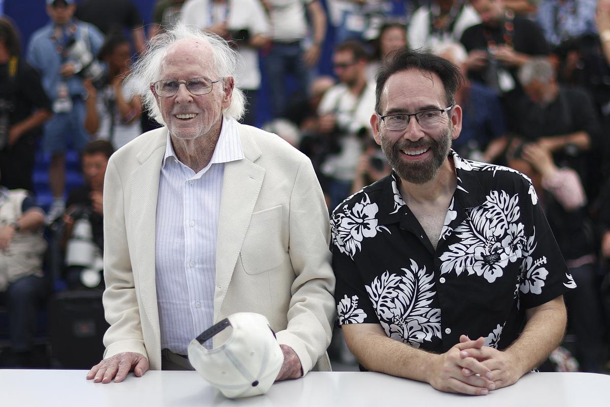 Actor Bruce Dern and Director Mike Mendez pose during a photocall for the documentary film "Dernsie: The Amazing Life of Bruce Dern" (Dernsie : La Vie incroyable de Bruce Dern) presented as part of Cannes Classics at the 79th Cannes Film Festival in Cannes, France, May 20, 2026. REUTERS/Gonzalo Fuentes
