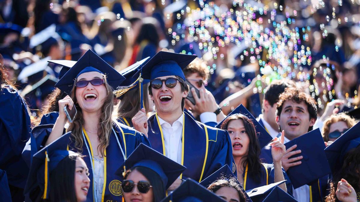 UC Berkeley undergraduate and graduate students of the Class of 2026 celebrate during their commencement ceremony at California Memorial Stadium in Berkeley, Calif., Saturday, May 16, 2026. (Ray Chavez/Bay Area News Group)