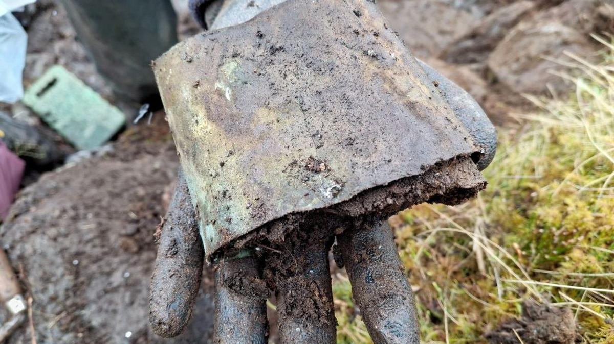 Copper alloy collar found at illicit whisky site discovered recently. (National Trust for Scotland via SWNS). 