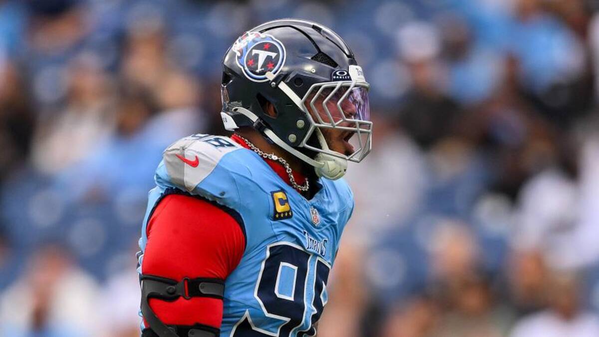  Dec 28, 2025; Nashville, Tennessee, USA; Tennessee Titans defensive tackle Jeffery Simmons (98) celebrates the fumble of New Orleans Saints quarterback Tyler Shough (6) during the first half at Nissan Stadium. Mandatory Credit: Steve Roberts-Imagn Images | Steve Roberts-Imagn Images 