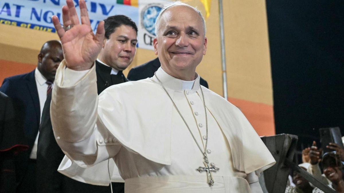 Pope Leo XIV waves to supporters as he leaves after his visit in April to the Ngul Zamba orphanage in Yaounde, Cameroon. The Vatican will release the pope's first encyclical, a pastoral letter, on Monday. Photo by Alberto Pizzoli/EPA/POOL