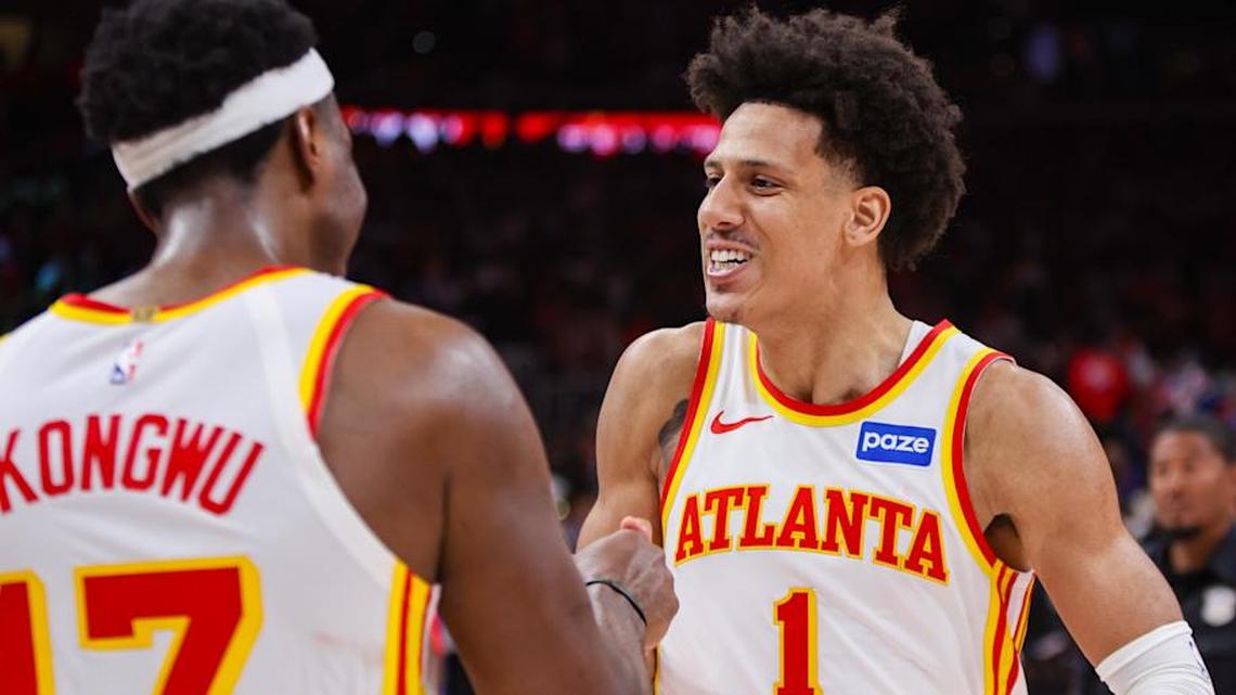  Apr 23, 2026; Atlanta, Georgia, USA; Atlanta Hawks forward Jalen Johnson (1) celebrates with forward Onyeka Okongwu (17) after a victory over the New York Knicks in game three of the first round of the 2026 NBA Playoffs at State Farm Arena. Mandatory Credit: Brett Davis-Imagn Images | Brett Davis-Imagn Images 