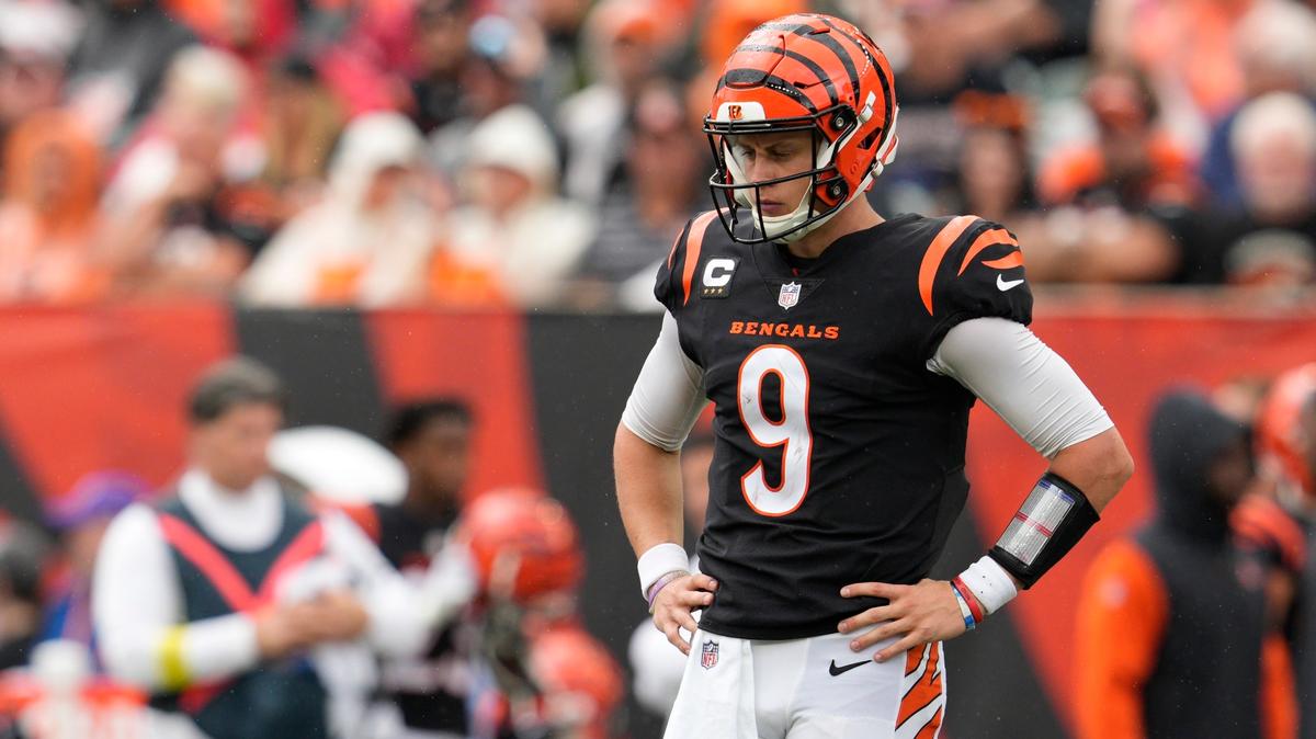 Cincinnati Bengals quarterback Joe Burrow (9) pauses between plays during the first half of an NFL football game against the Pittsburgh Steelers, Sunday, Sept. 11, 2022, in Cincinnati. (AP Photo/Jeff Dean)