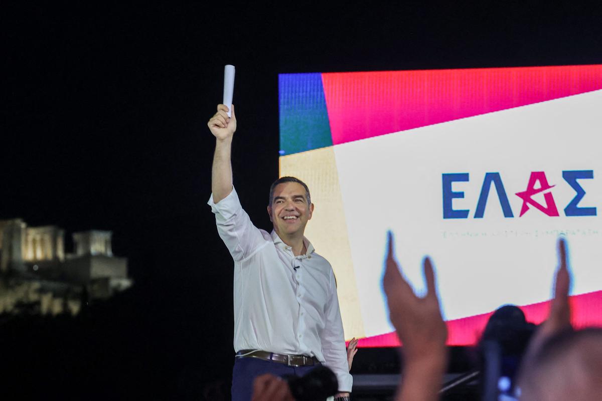 Greece's former Prime Minister Alexis Tsipras unveils the name of his new political party, ELAS-Greek Left Alliance, ahead of the 2027 parliamentary elections, in Athens, Greece, May 26, 2026. REUTERS/Louisa Gouliamaki