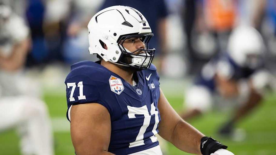  Dec 31, 2024; Glendale, AZ, USA; Penn State Nittany Lions offensive lineman Olaivavega Ioane (71) against the Boise State Broncos during the Fiesta Bowl at State Farm Stadium. Mandatory Credit: Mark J. Rebilas-Imagn Images | Mark J. Rebilas-Imagn Images 