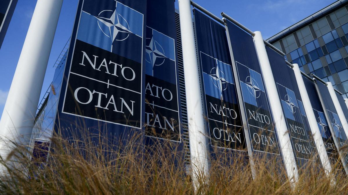 FILE PHOTO: Banners hang outside the NATO headquarters ahead of the a meeting of the alliance's foreign ministers, in Brussels, Belgium November 28, 2023. REUTERS/Yves Herman/File Photo