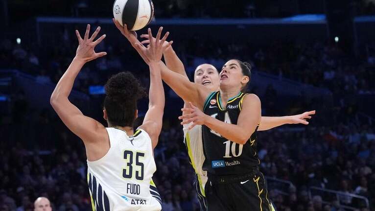 Late offensive boards lead Wings past Sparks 