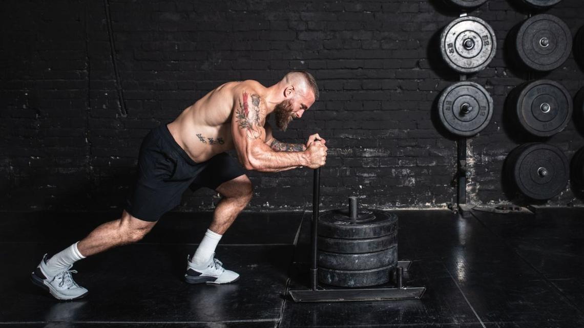 Struggling to Finish the HYROX Row or Wall Balls? This 'Breathe Tall' Strategy Is the Secret to Holding Your Pace 