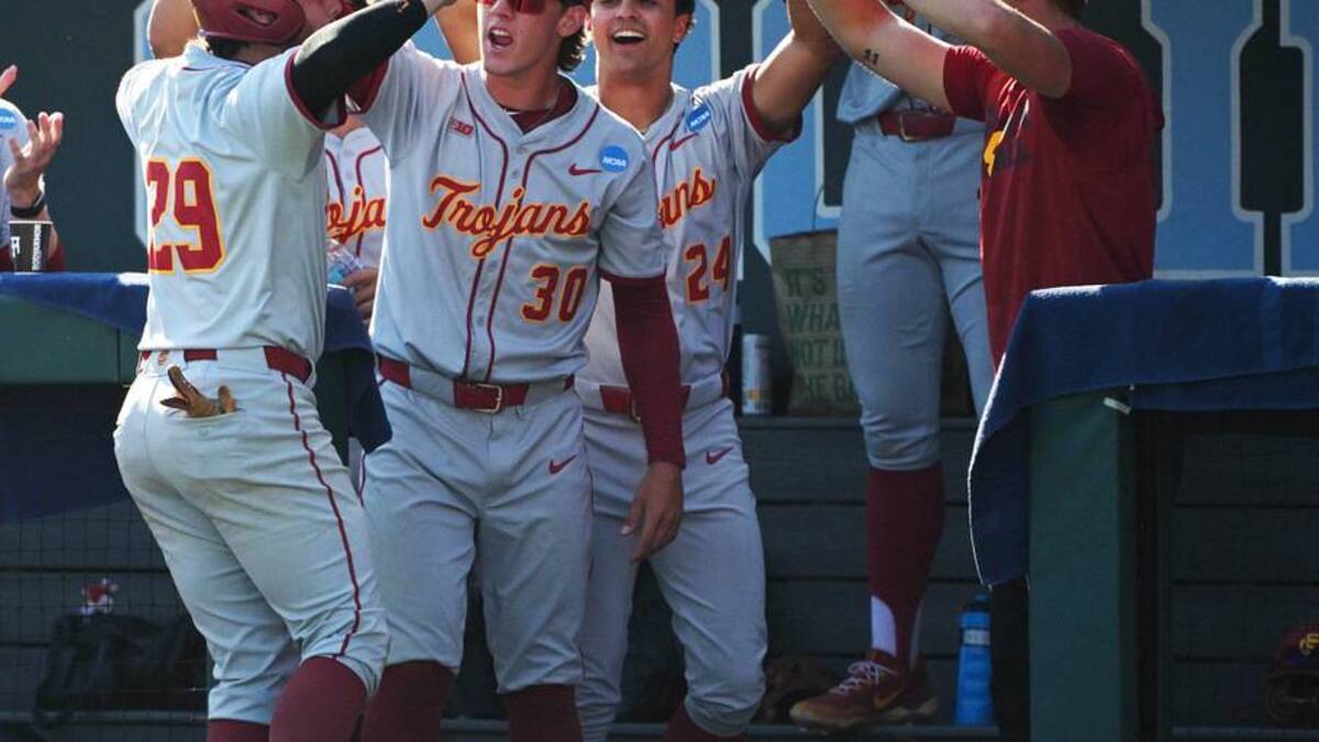  Jun 5, 2026; Chapel Hill, NC, USA; The USC Trojans celebrate USC Trojans catcher Andrew Lamb (29) during the seventh inning against the USC Trojans at Boshamer Stadium. Mandatory Credit: Zachary Taft-Imagn Images | Zachary Taft-Imagn Images 