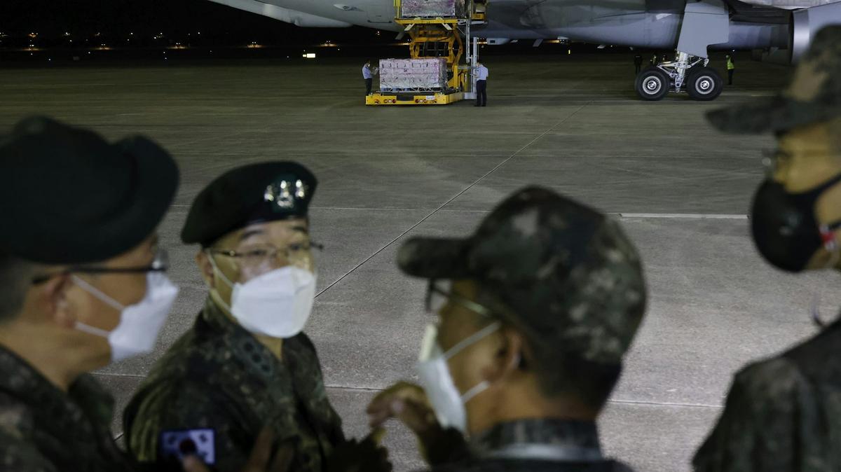 South Korean soldiers oversee the arrival of a batch of Johnson & Johnson’s Janssen COVID-19 vaccines donated by the U.S. government on June 5, 2021. 