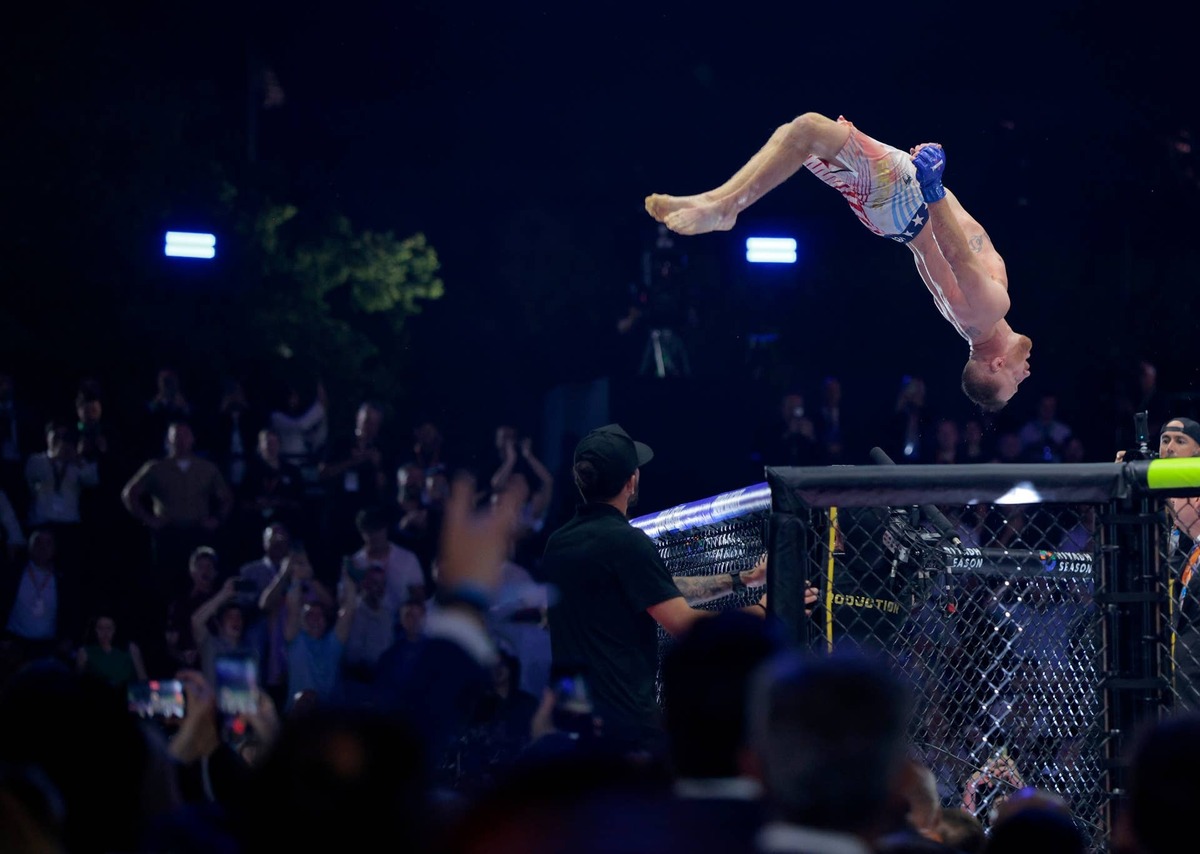  Justin Gaethje celebrates with a backflip off the octagon after defeating Ilia Topuria Chip Somodevilla/Getty Images