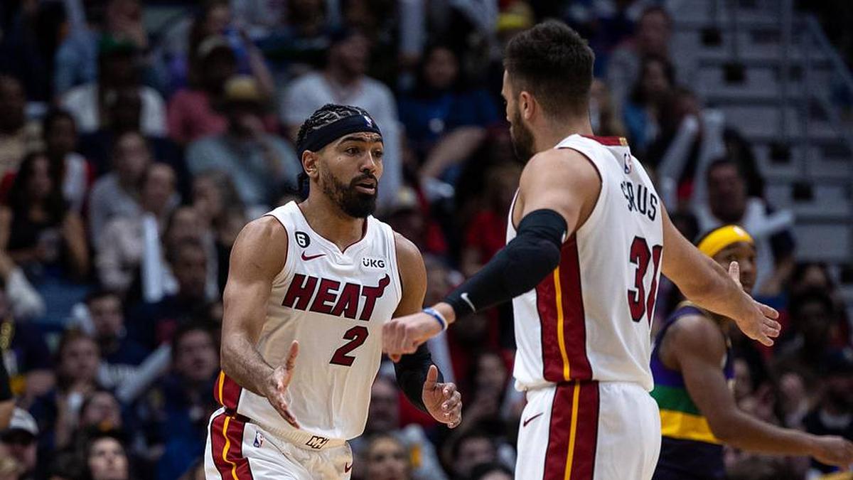  Jan 18, 2023; New Orleans, Louisiana, USA; Miami Heat guard Gabe Vincent (2) slaps hands with guard Max Strus (31) after making a three point basket against the New Orleans Pelicans during the second half at Smoothie King Center. Mandatory Credit: Stephen Lew-Imagn Images | Stephen Lew-Imagn Images 