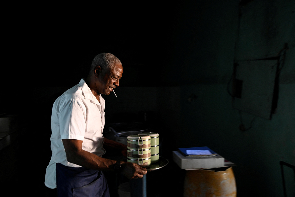 Jorge, an employee at a Sistema de Atencion a la Familia (SAF) dining hall, prepares meals that provide rations to the people in need in Havana, Cuba, March 10, 2026. Cuba has appealed to the United Nations World Food Programme for support to maintain meals for vulnerable groups. "This is a very high-risk population right now," he said. REUTERS/Norlys Perez