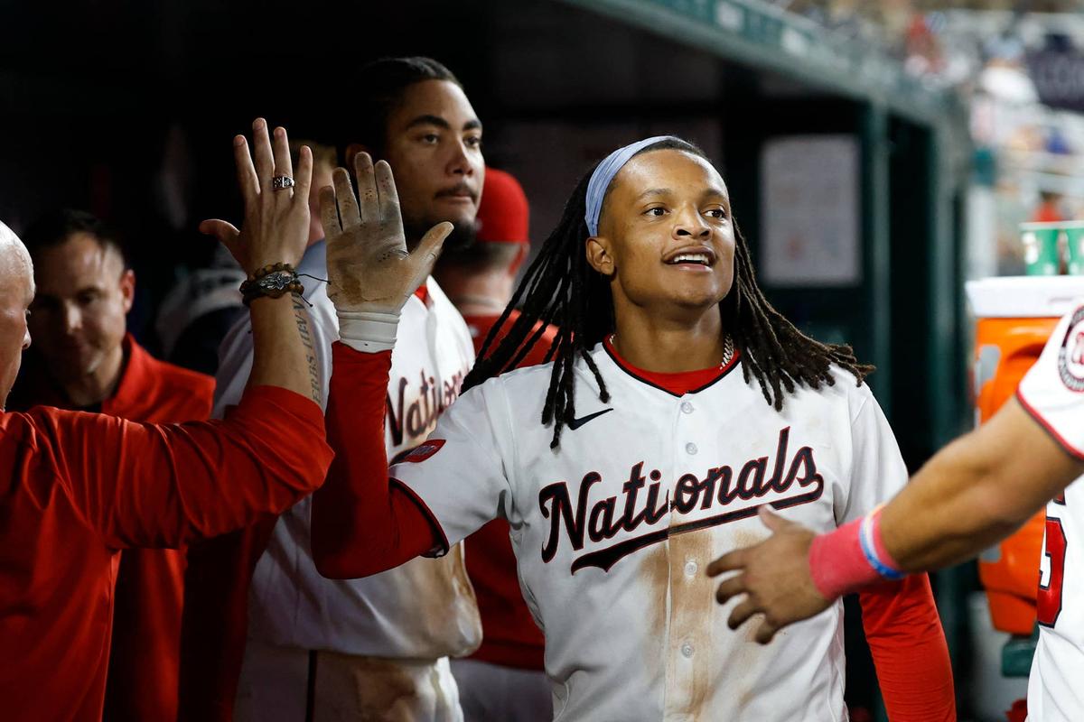  Washington Nationals shortstop CJ Abrams (5) celebrates with teammates after scoring a run on an RBI double by Nationals third baseman Brady House (not pictured) against the Minnesota Twins during the sixth inning at Nationals Park on May 6, 2026. Geoff Burke-Imagn Images Geoff Burke-Imagn Images
