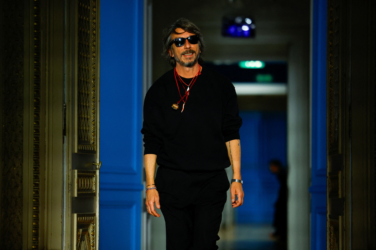 Designer Pierpaolo Piccioli appears at the end of his Menswear ready-to-wear Fall/Winter 2024-2025 collection show for fashion house Valentino during Men's Fashion Week in Paris, France, January 20, 2024. REUTERS/Sarah Meyssonnier
