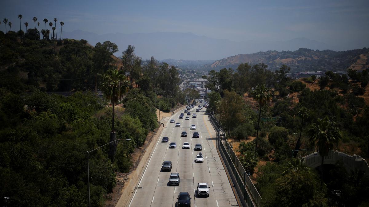FILE PHOTO: Cars drive along the 110 Freeway in Los Angeles, California, U.S., May 22, 2025. REUTERS/Daniel Cole/File Photo