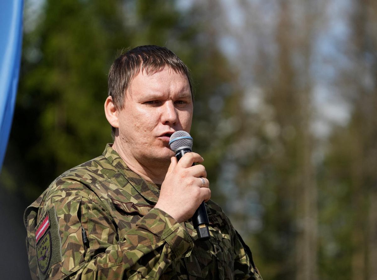 Head of the Latvian Army Autonomous Systems Competence Centre Modris Kairiss speaks during the NATO Innovation Range demo day in the Selija military training field near Viesite, Latvia May 26, 2026. REUTERS/Ints Kalnins