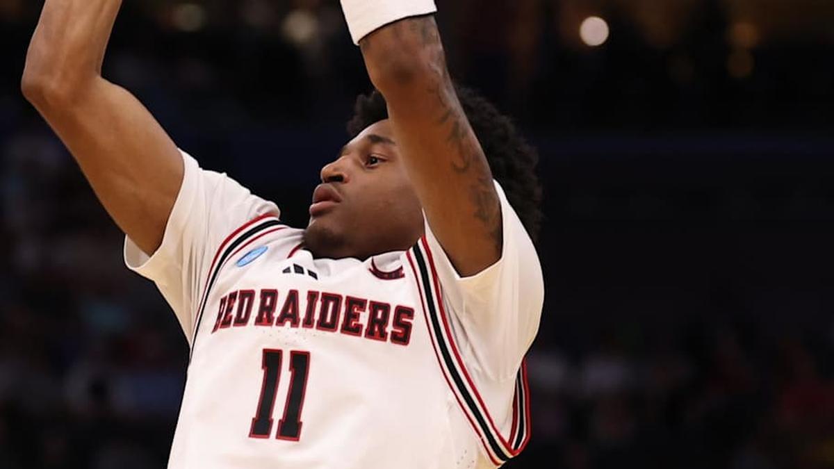  Mar 20, 2026; Tampa, FL, USA; Texas Tech Red Raiders guard Jaylen Petty (11) shoots against Akron Zips guard Evan Mahaffey (12) in the first half during a first round game of the men's 2026 NCAA Tournament at Benchmark International Arena. Mandatory Credit: Matt Pendleton-Imagn Images | Matt Pendleton-Imagn Images 