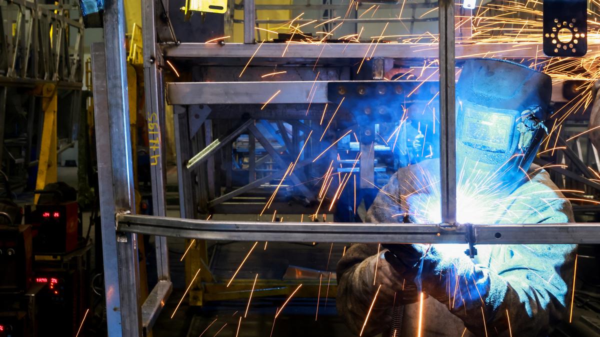 FILE PHOTO: A worker operates on the bus body production line at the factory of Marcopolo, one of the world's largest bus manufacturers with operations across multiple continents, in Caxias do Sul, Brazil, March 25, 2026. REUTERS/Diego Vara/File Photo
