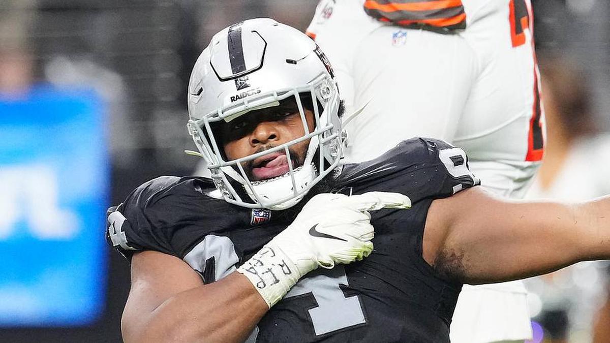  Sep 29, 2024; Paradise, Nevada, USA; Las Vegas Raiders defensive tackle Christian Wilkins (94) celebrates after a penalty overturned a scoring play by the Cleveland Browns during the fourth quarter at Allegiant Stadium. Mandatory Credit: Stephen R. Sylvanie-Imagn Images | Stephen R. Sylvanie-Imagn Images 