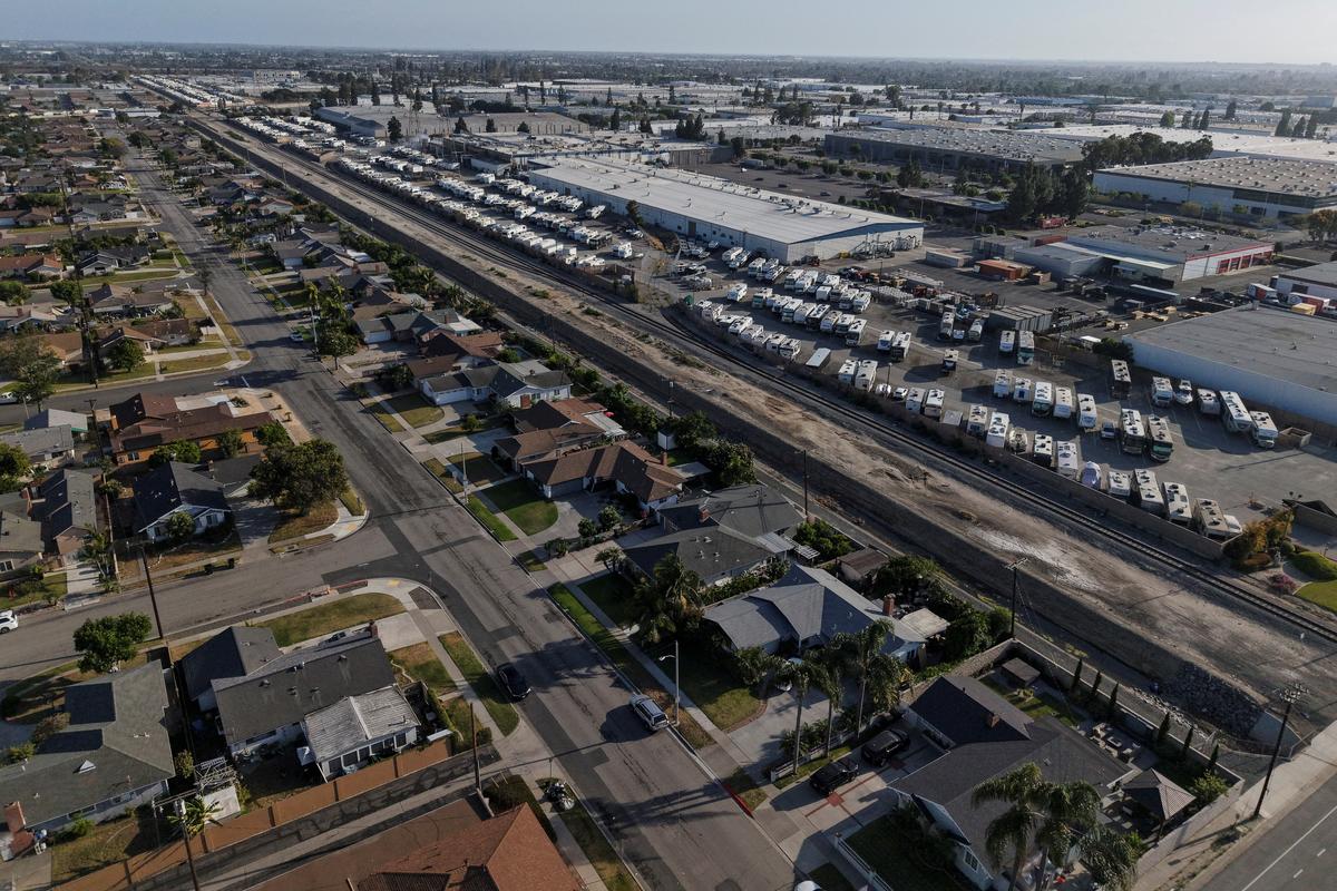 A drone picture shows the site and neighboring areas as a chemical incident involving a failing tank of flammable liquid called methyl methacrylate, used in the aerospace industry, has forced an evacuation in the surrounding area in Garden Grove, California, U.S. May, 22, 2026. REUTERS/ Caroline Brehman