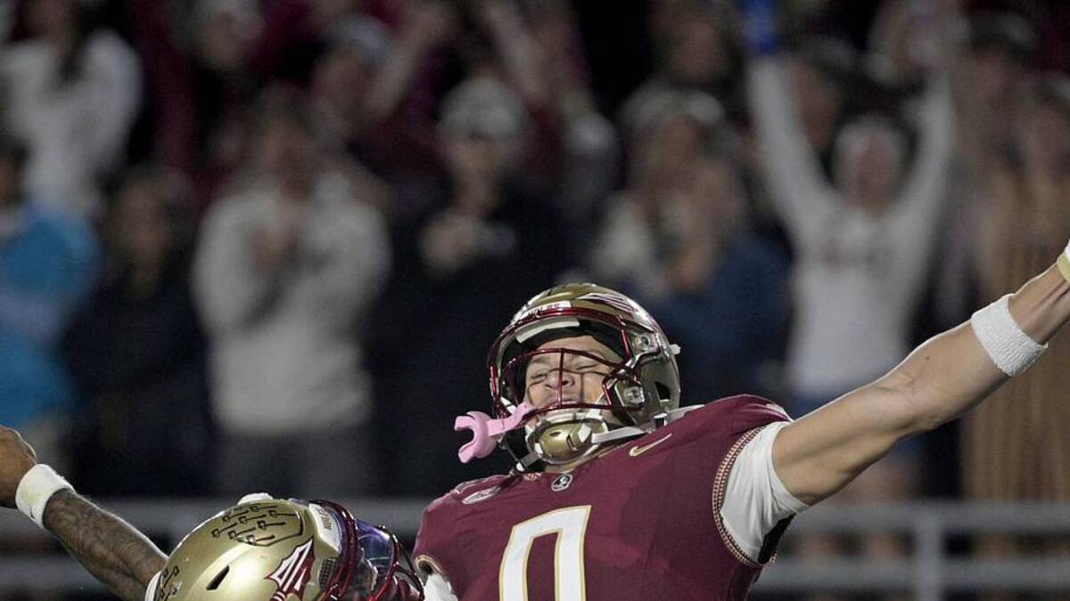  Nov 1, 2025; Tallahassee, Florida, USA; Florida State Seminoles quarterback Tommy Castellanos (1) celebrates a touchdown with wide receiver Duce Robinson (0) during the second half against the Wake Forest Demon Deacons at Doak S. Campbell Stadium. | Melina Myers-Imagn Images 