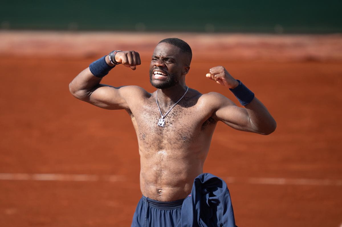 May 28, 2026; Paris, France; Frances Tiafoe of the United States celebrates winning his match against Hubert Hurkacz of Poland on day five at Stade Roland Garros. Mandatory Credit: Susan Mullane-Imagn Images