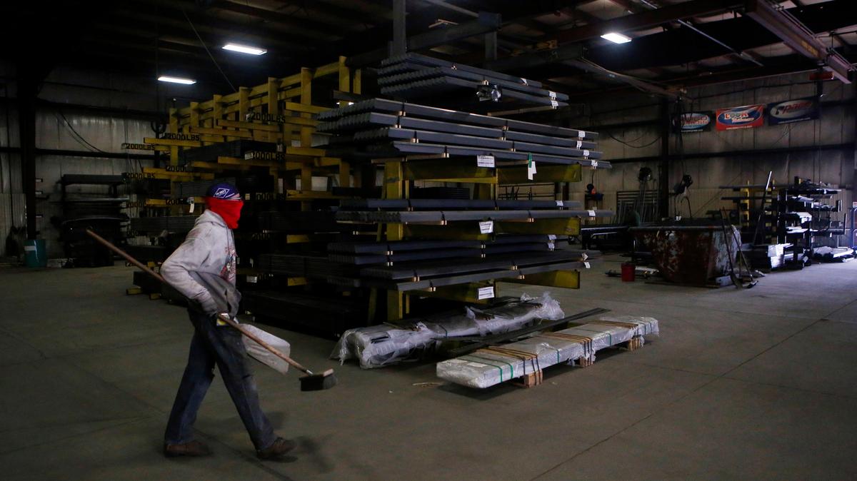 A worker walks through the weld shop at Look Trailers cargo trailer manufacturing facility in Middlebury, Indiana, U.S., April 1, 2021. Picture taken April 1, 2021.  REUTERS/Eileen T. Meslar
