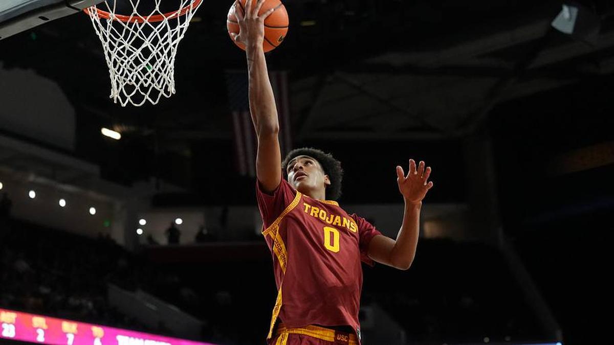  Mar 7, 2026; Los Angeles, California, USA; Southern California Trojans guard Alijah Arenas (0) shoots the ball against the UCLA Bruins in the second half at the Galen Center. Mandatory Credit: Kirby Lee-Imagn Images | Kirby Lee-Imagn Images 